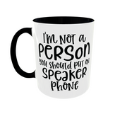White mug with black rim and handle, with the text i'm not a person you should put on speaker phone. Funny Gift