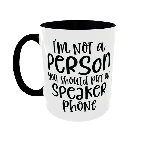 White mug with black rim and handle, with the text i'm not a person you should put on speaker phone. Funny Gift